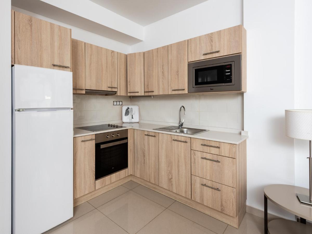 Apartamentos Las Palmeras 莫甘海滩 外观 照片
